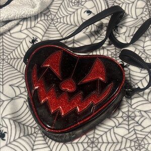 Heart-Shaped Black and Red Crossbody Bag